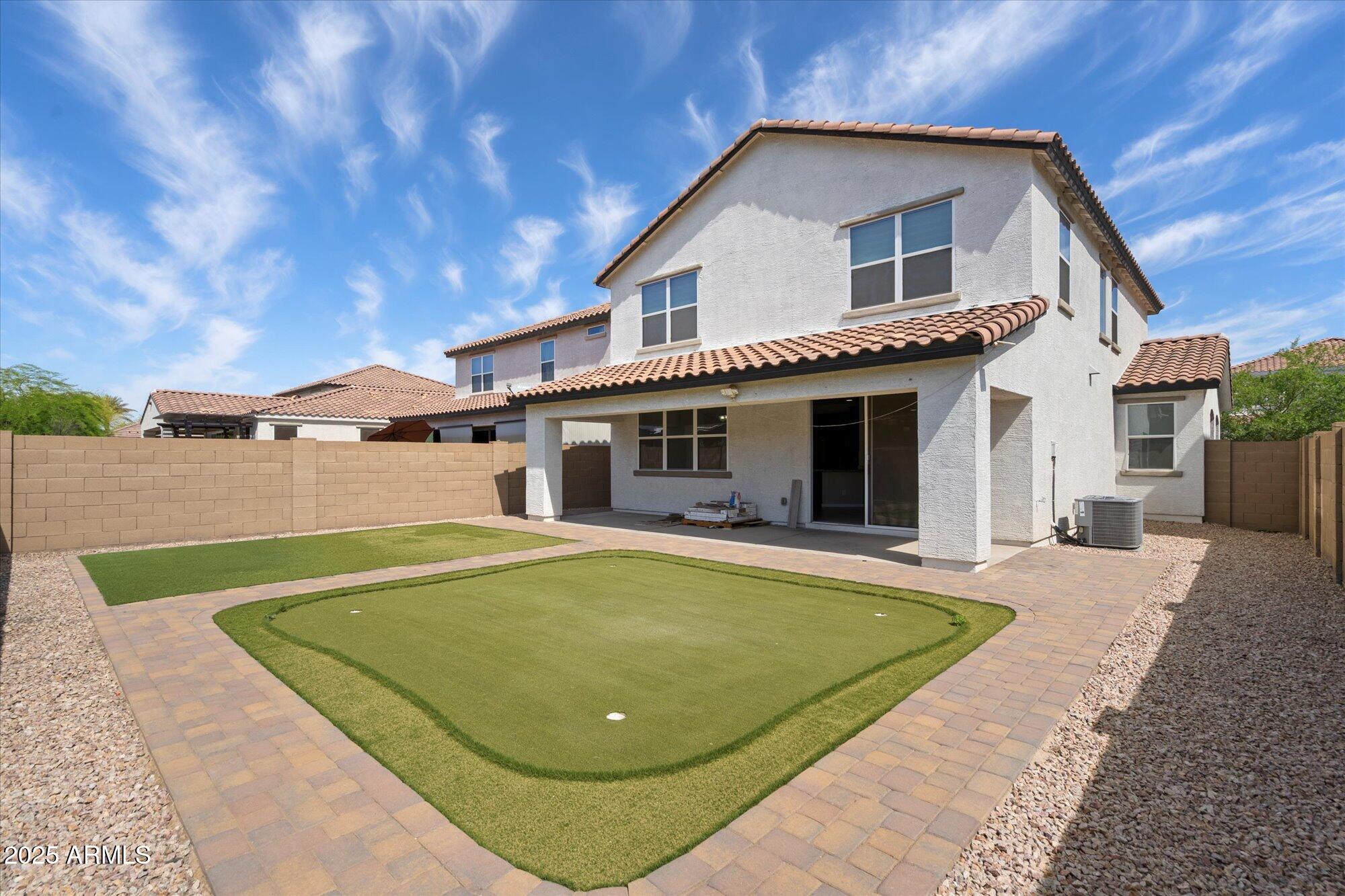 737 East Harwell Road Phoenix, AZ 85042 - Photo 25 of 28 a view of a house with pool and a yard