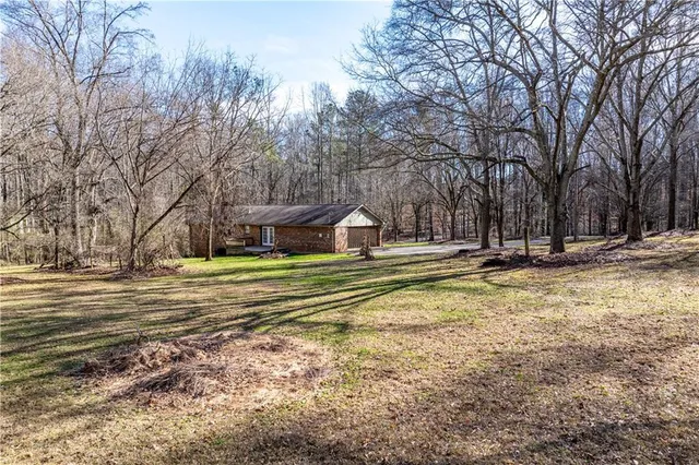 a view of a playground with basketball court