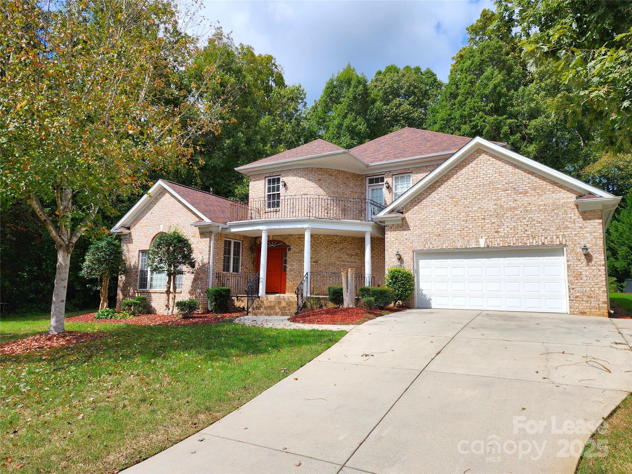 5524 Strabane Drive Matthews, NC 28104 - Photo 1 of 41 a front view of a house with a yard