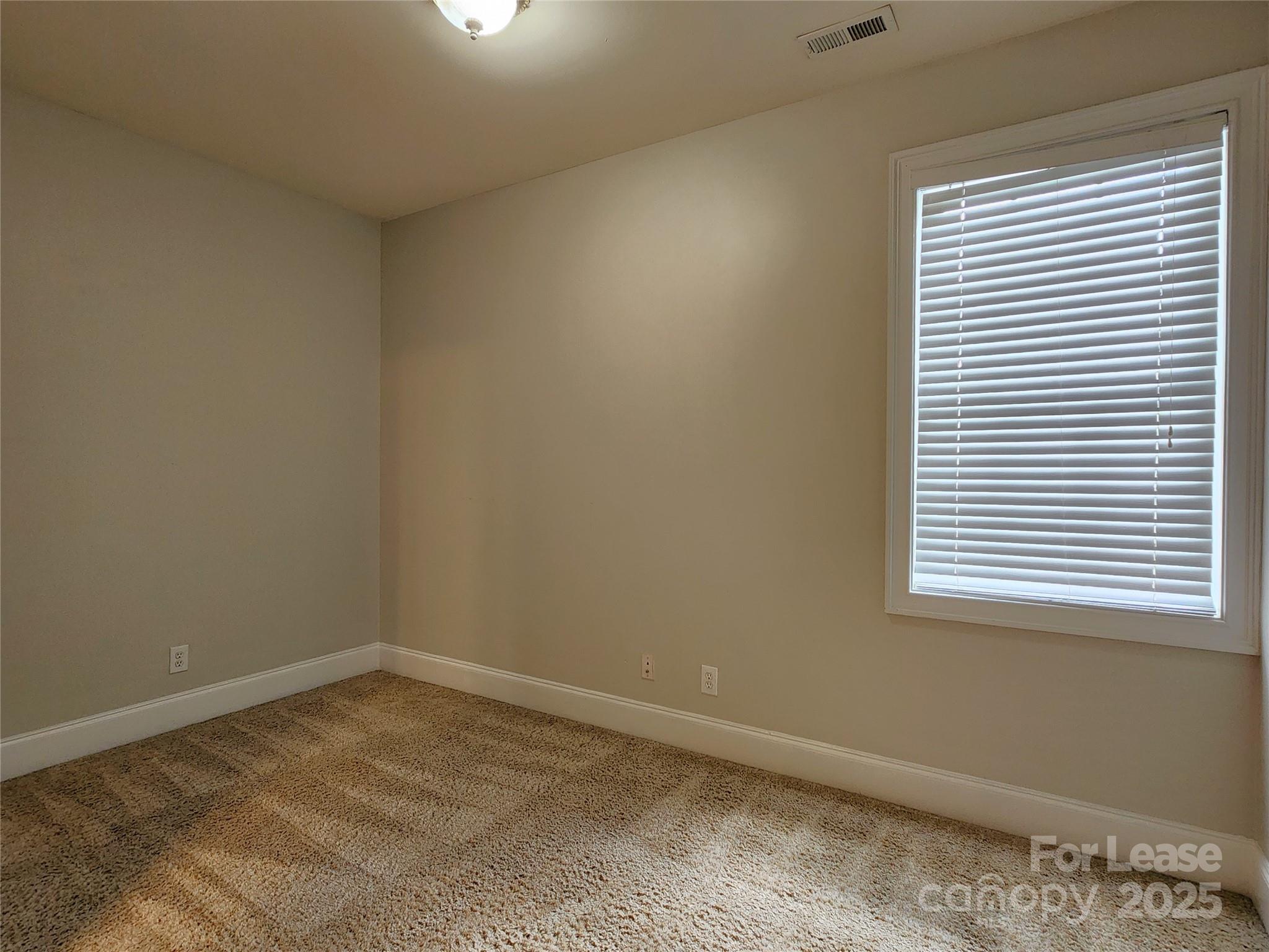 5524 Strabane Drive Matthews, NC 28104 - Photo 26 of 41 an empty room with a window