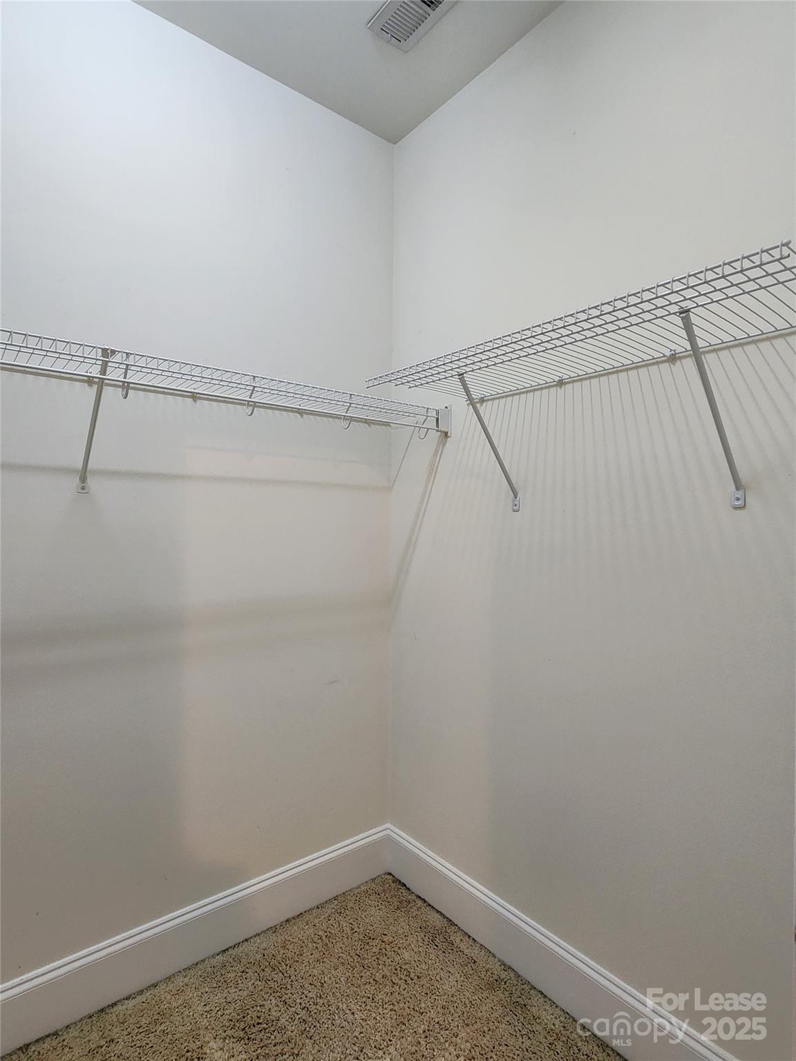 5524 Strabane Drive Matthews, NC 28104 - Photo 34 of 41 a view of a room with racks on the wall