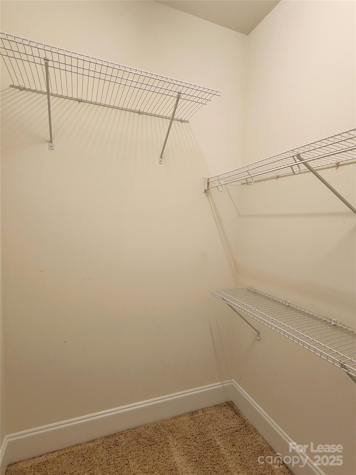 5524 Strabane Drive Matthews, NC 28104 - Photo 37 of 41 a view of a room with racks on the wall