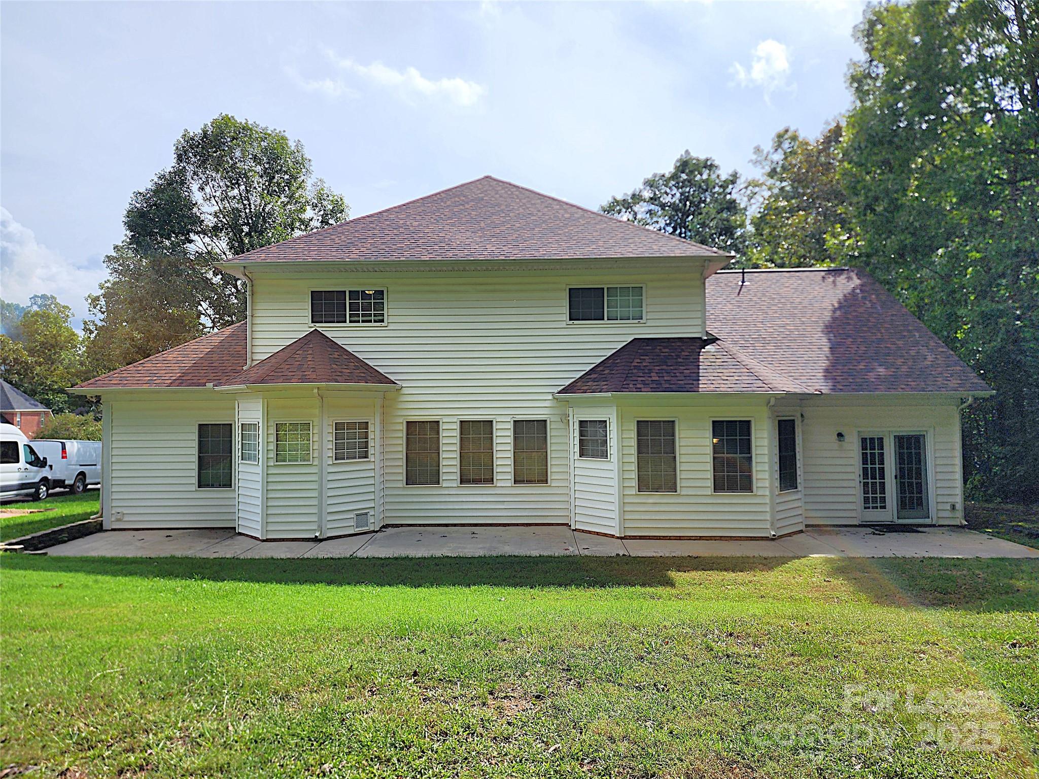 5524 Strabane Drive Matthews, NC 28104 - Photo 39 of 41 a front view of a house with a garden