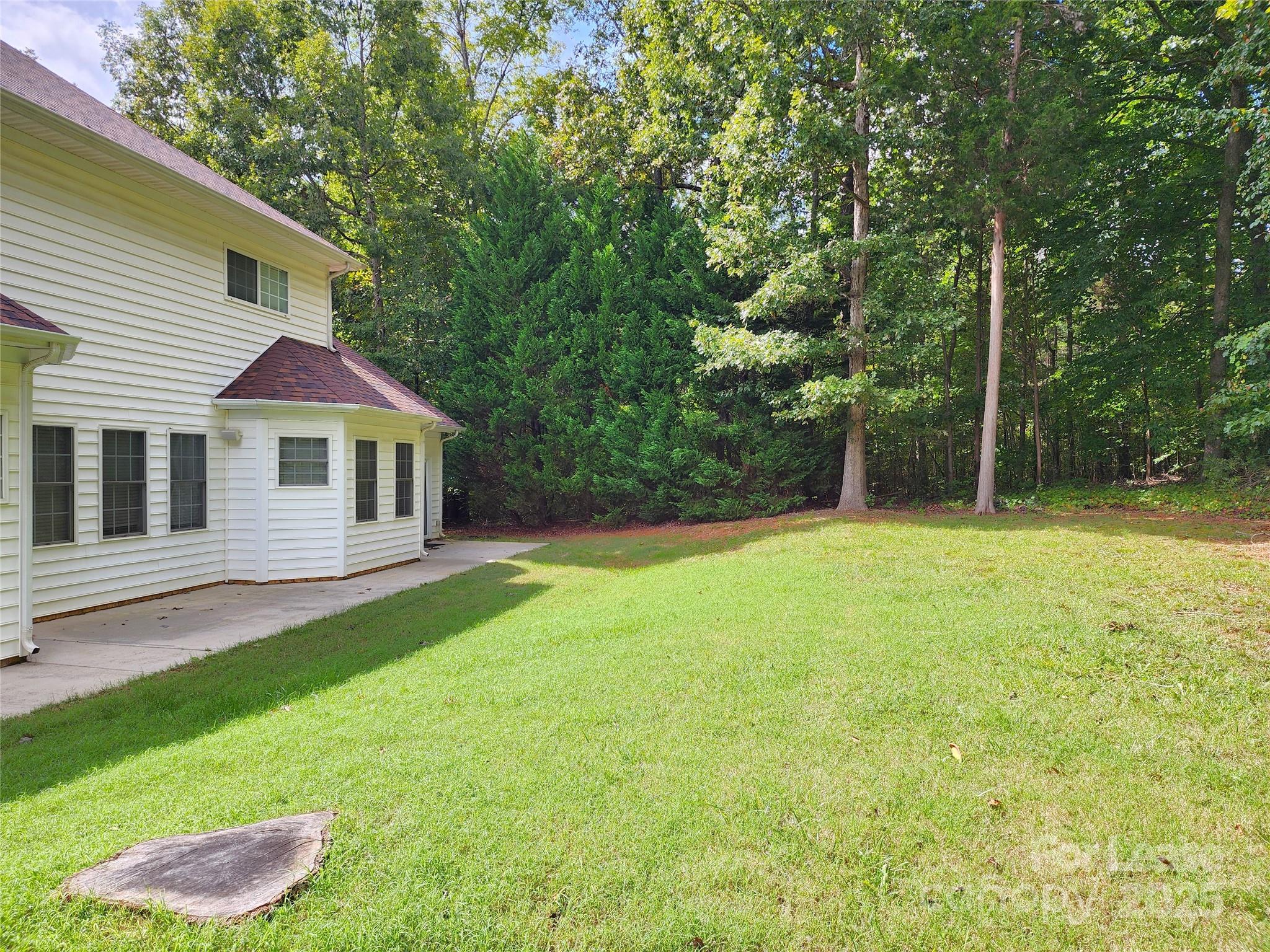 5524 Strabane Drive Matthews, NC 28104 - Photo 40 of 41 a front view of a house with yard and green space