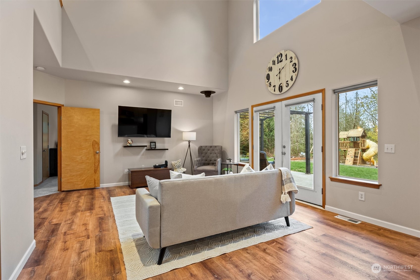 2068 Academy Road Bellingham, WA 98226 - Photo 13 of 40 a living room with furniture and a flat screen tv