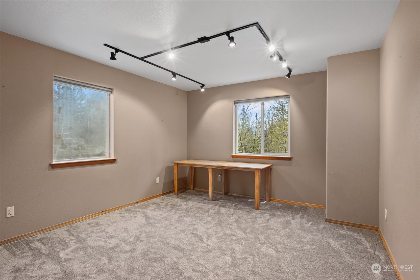 2068 Academy Road Bellingham, WA 98226 - Photo 28 of 40 a very nice looking room with a window and a ceiling fan