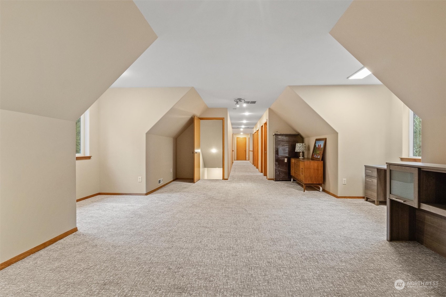 2068 Academy Road Bellingham, WA 98226 - Photo 35 of 40 a view of a big room with entryway and a fireplace