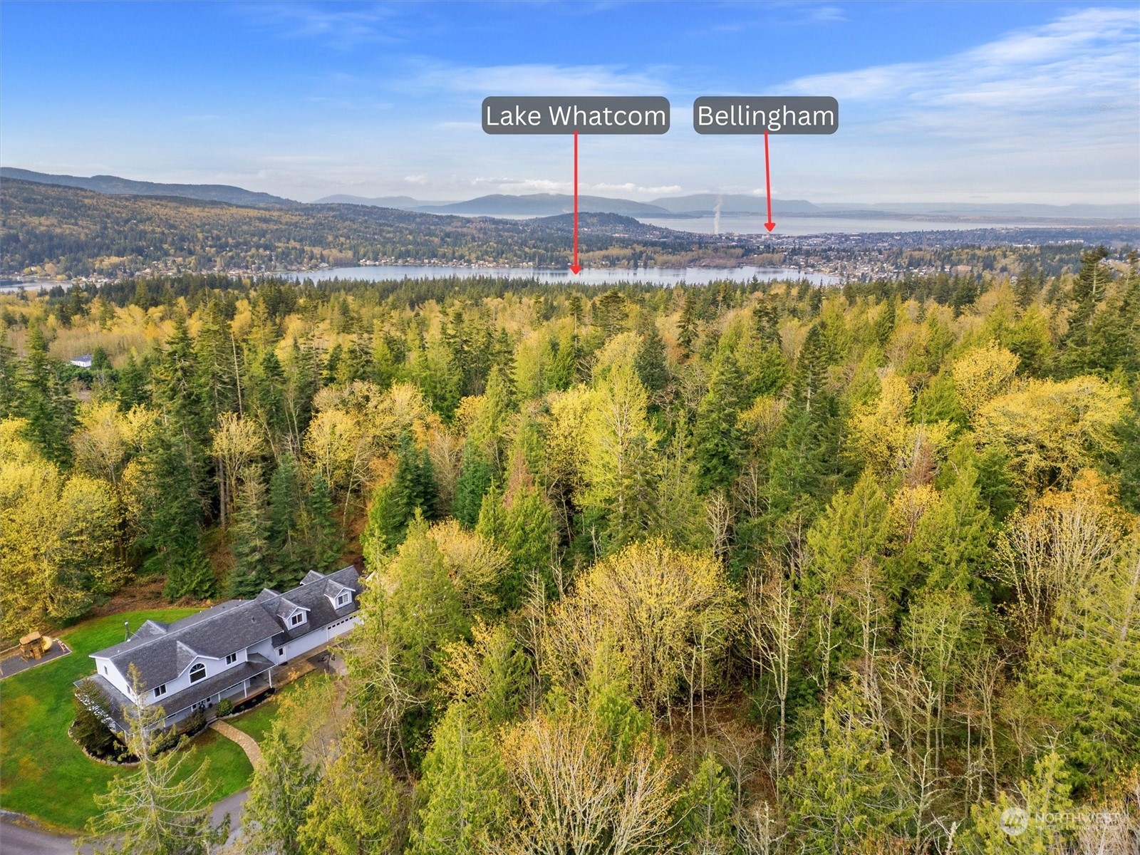 2068 Academy Road Bellingham, WA 98226 - Photo 9 of 40 a view of a swimming pool with lawn chairs and wooden fence