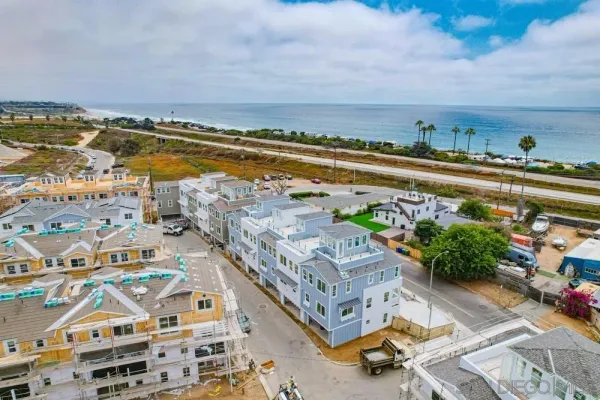 a view of a city with an ocean view