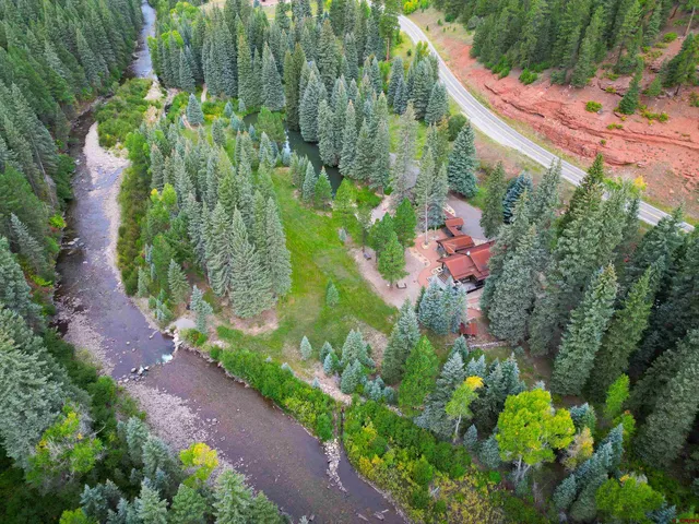 a bathroom with a double vanity sink and mirror