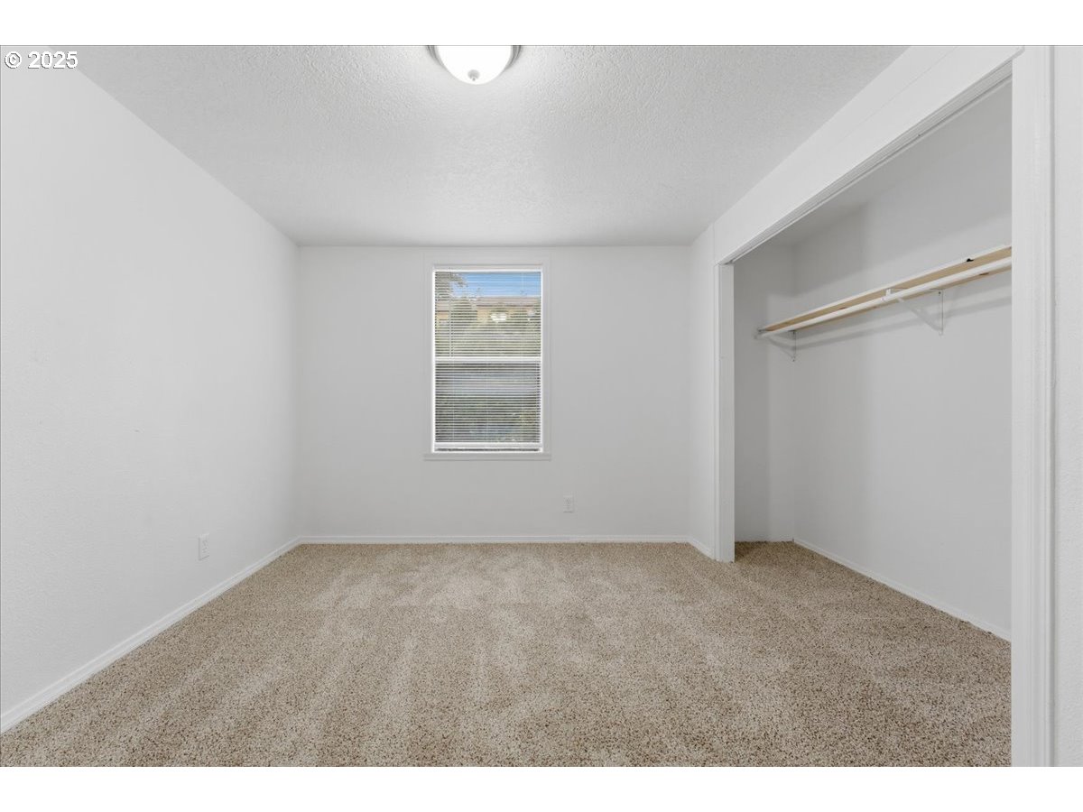 18427 Southeast Yamhill Street Gresham, OR 97233 - Photo 13 of 39 a view of an empty room with a window