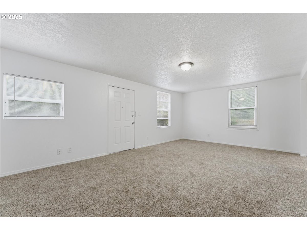 18427 Southeast Yamhill Street Gresham, OR 97233 - Photo 21 of 39 a view of an empty room with a window