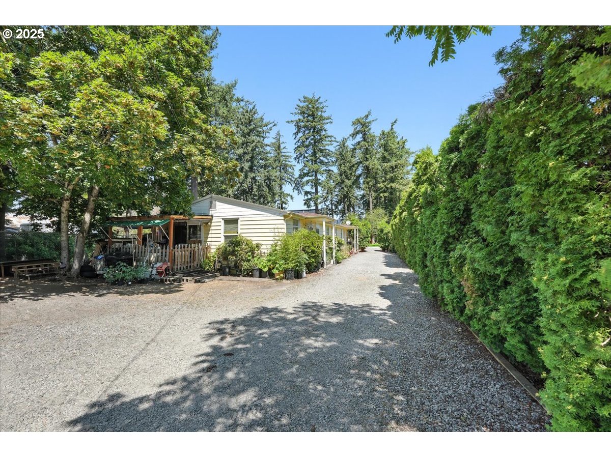 18427 Southeast Yamhill Street Gresham, OR 97233 - Photo 3 of 39 a view of a outdoor space of a house
