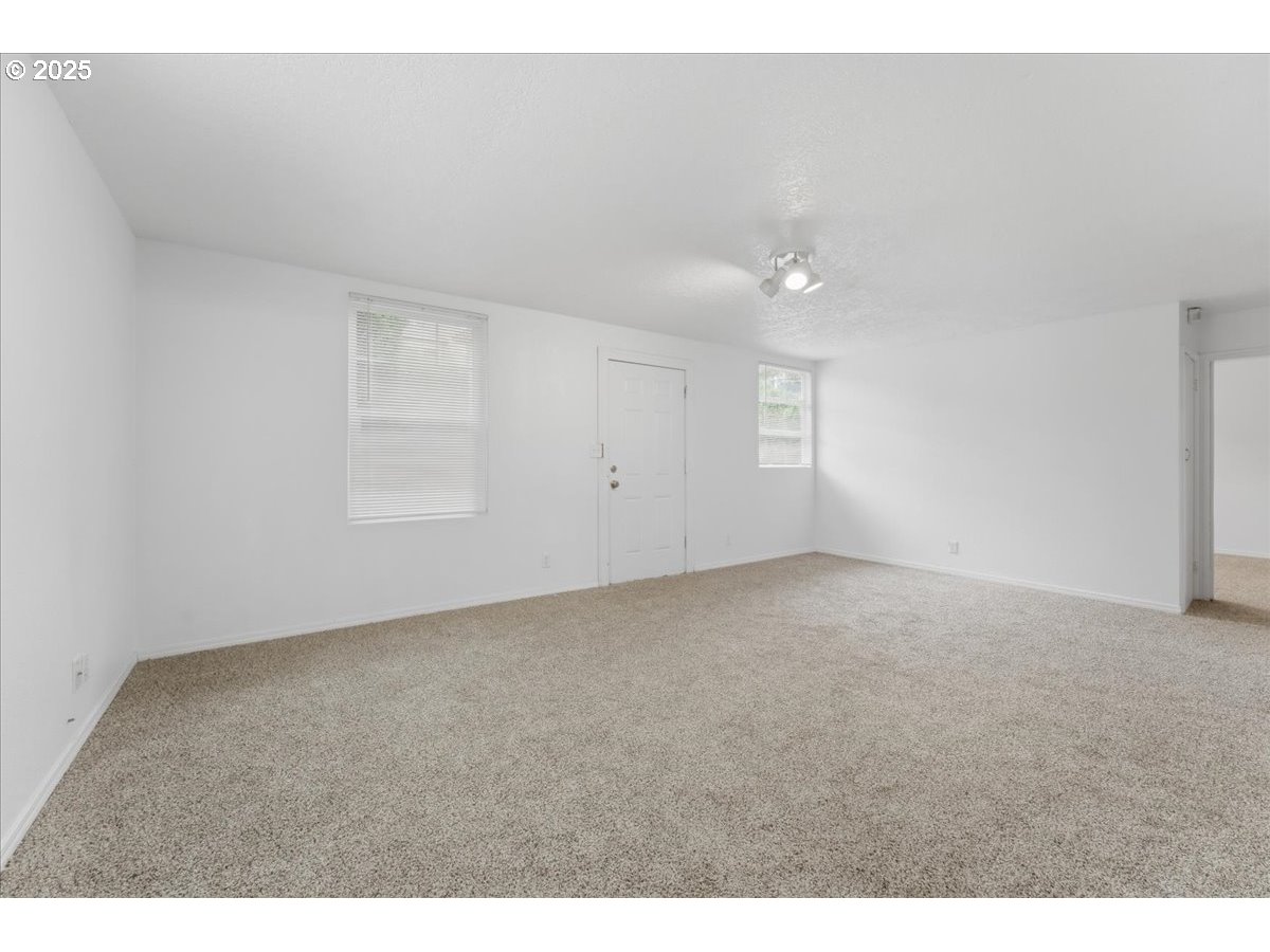 18427 Southeast Yamhill Street Gresham, OR 97233 - Photo 39 of 39 a view of an empty room with a window
