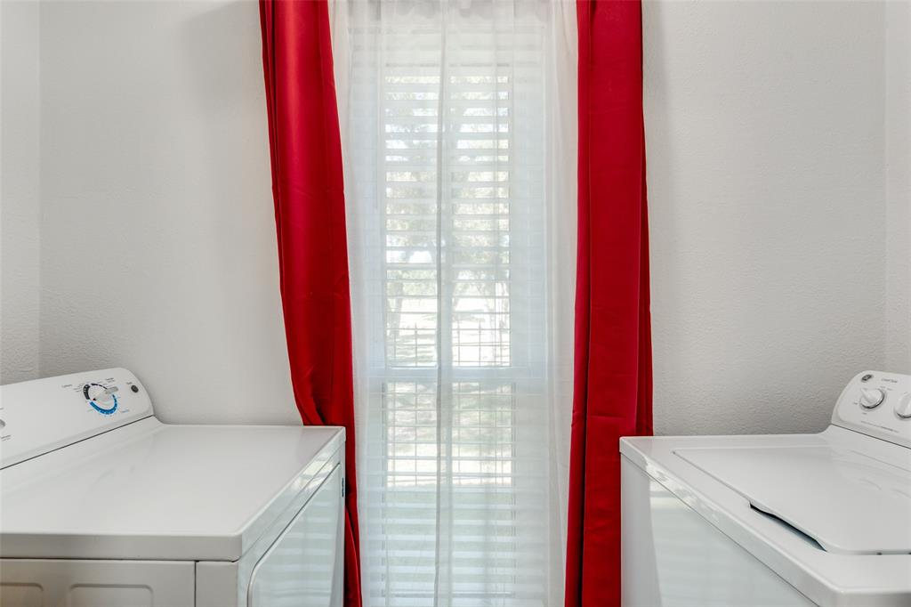 5981 Arapaho Road, Unit 1603 Dallas, TX 75248 - Photo 16 of 25 a utility room with dryer and washer