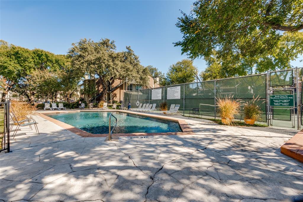 5981 Arapaho Road, Unit 1603 Dallas, TX 75248 - Photo 23 of 25 a view of a swimming pool with a patio