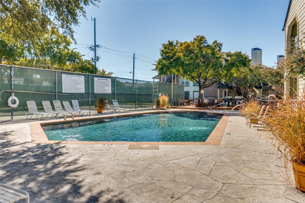 5981 Arapaho Road, Unit 1603 Dallas, TX 75248 - Photo 24 of 25 a view of a park with swings and slides