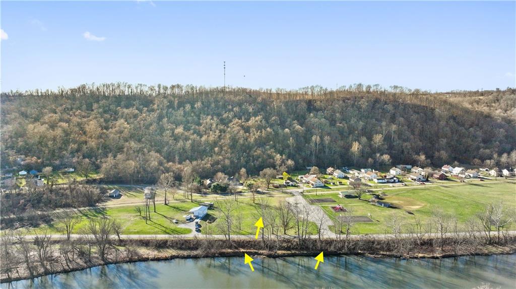 429 River Road Perryopolis, PA 15473 - Photo 4 of 14 a view of a lake with a mountain