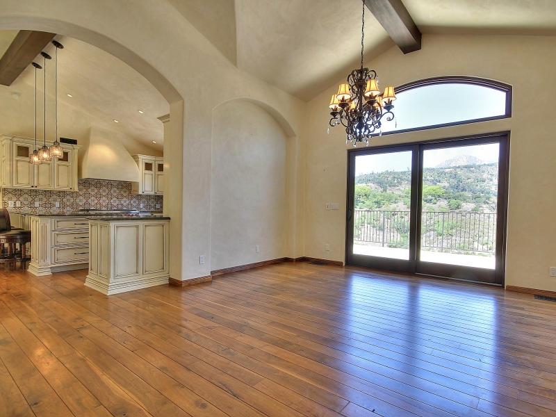 219 Conejo Road Santa Barbara, CA 93103 - Photo 10 of 24 a view of a livingroom with wooden floor and a kitchen