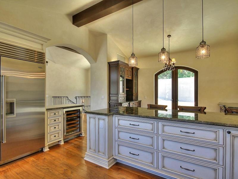 219 Conejo Road Santa Barbara, CA 93103 - Photo 8 of 24 a view of a kitchen center island and stainless steel appliances