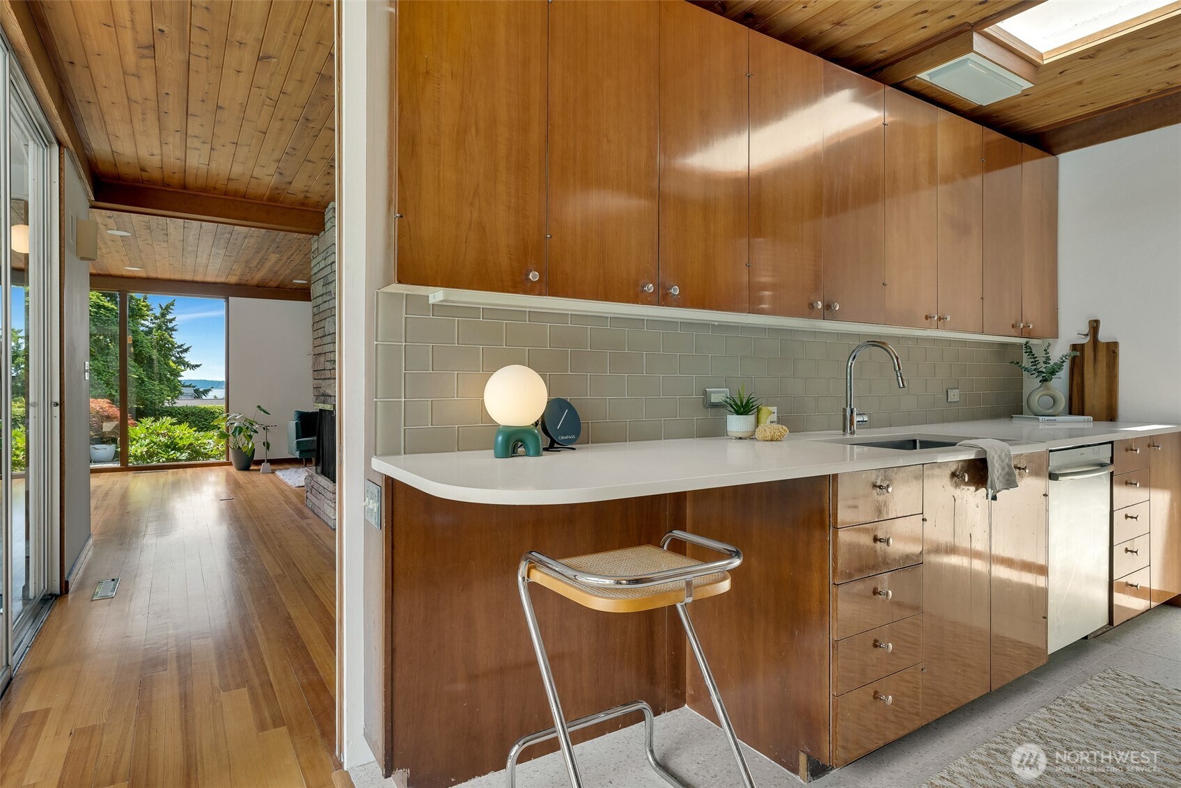 615 Bayside Road Bellingham, WA 98225 - Photo 12 of 31 a living room with a sink furniture and a wooden floor