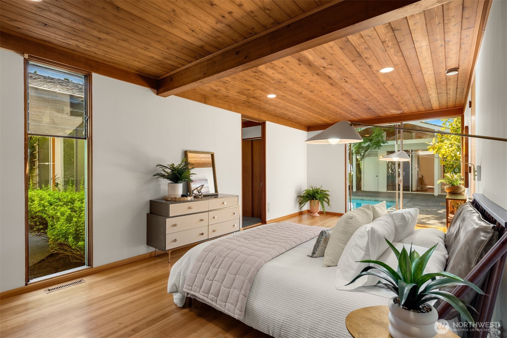 615 Bayside Road Bellingham, WA 98225 - Photo 16 of 31 a bedroom with furniture and a large window