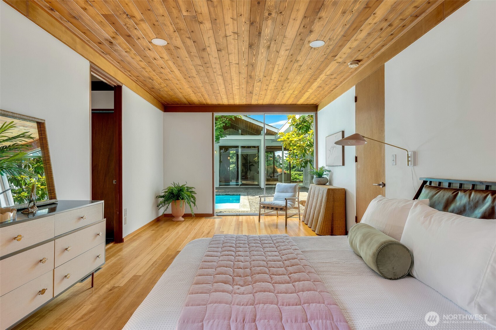 615 Bayside Road Bellingham, WA 98225 - Photo 17 of 31 a bedroom with furniture and a large window