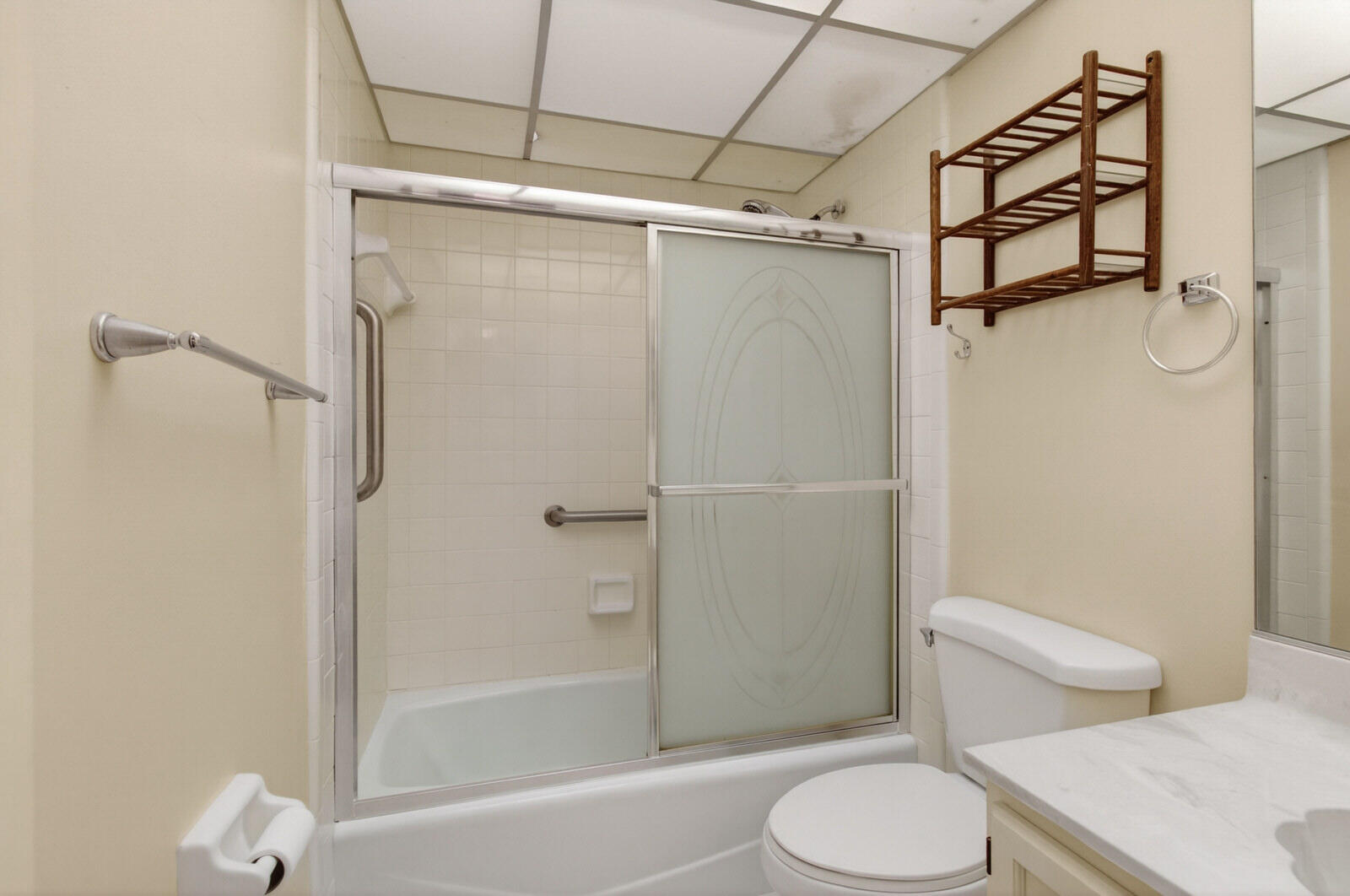 3951 Northeast 19th Road, Unit 1701 Pompano Beach, FL 33064 - Photo 48 of 82 a white toilet sitting next to a bath tub and a shower