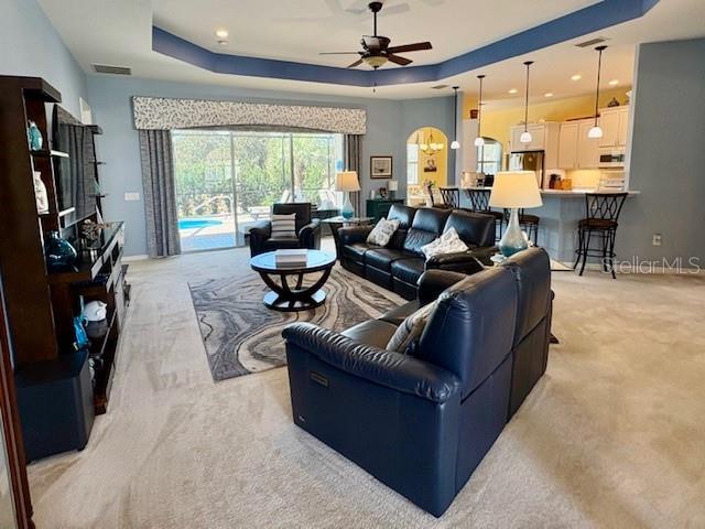 6261 Pinehurst Loop Winter Haven, FL 33884 - Photo 18 of 76 a living room with furniture and a large window