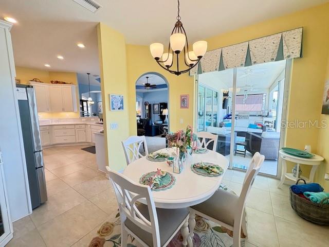 6261 Pinehurst Loop Winter Haven, FL 33884 - Photo 27 of 76 a view of a dining room and livingroom view