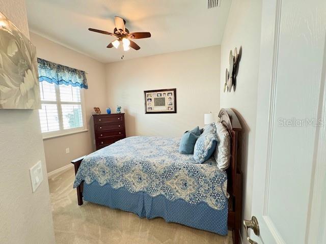 6261 Pinehurst Loop Winter Haven, FL 33884 - Photo 36 of 76 a bedroom with a bed and window