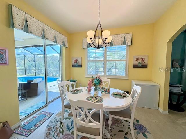6261 Pinehurst Loop Winter Haven, FL 33884 - Photo 44 of 76 a view of a dining room with furniture window and outside view