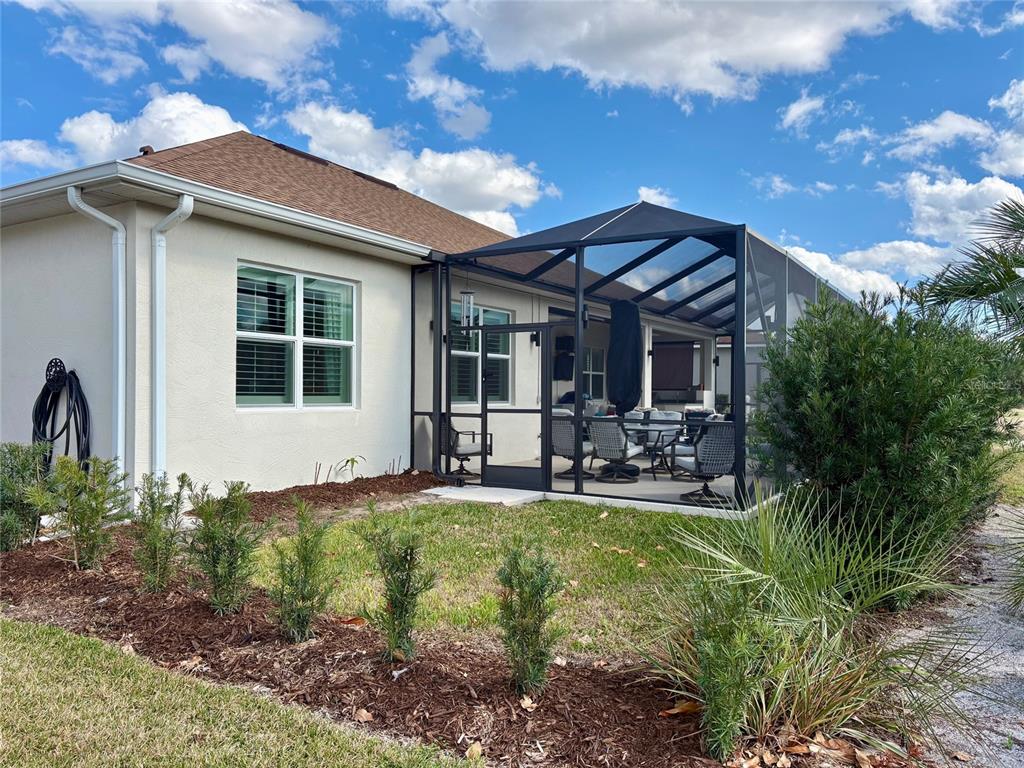 6261 Pinehurst Loop Winter Haven, FL 33884 - Photo 9 of 76 a front view of a house with patio