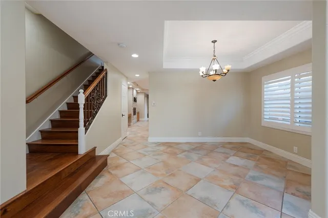 a kitchen that has a lot of cabinets in it