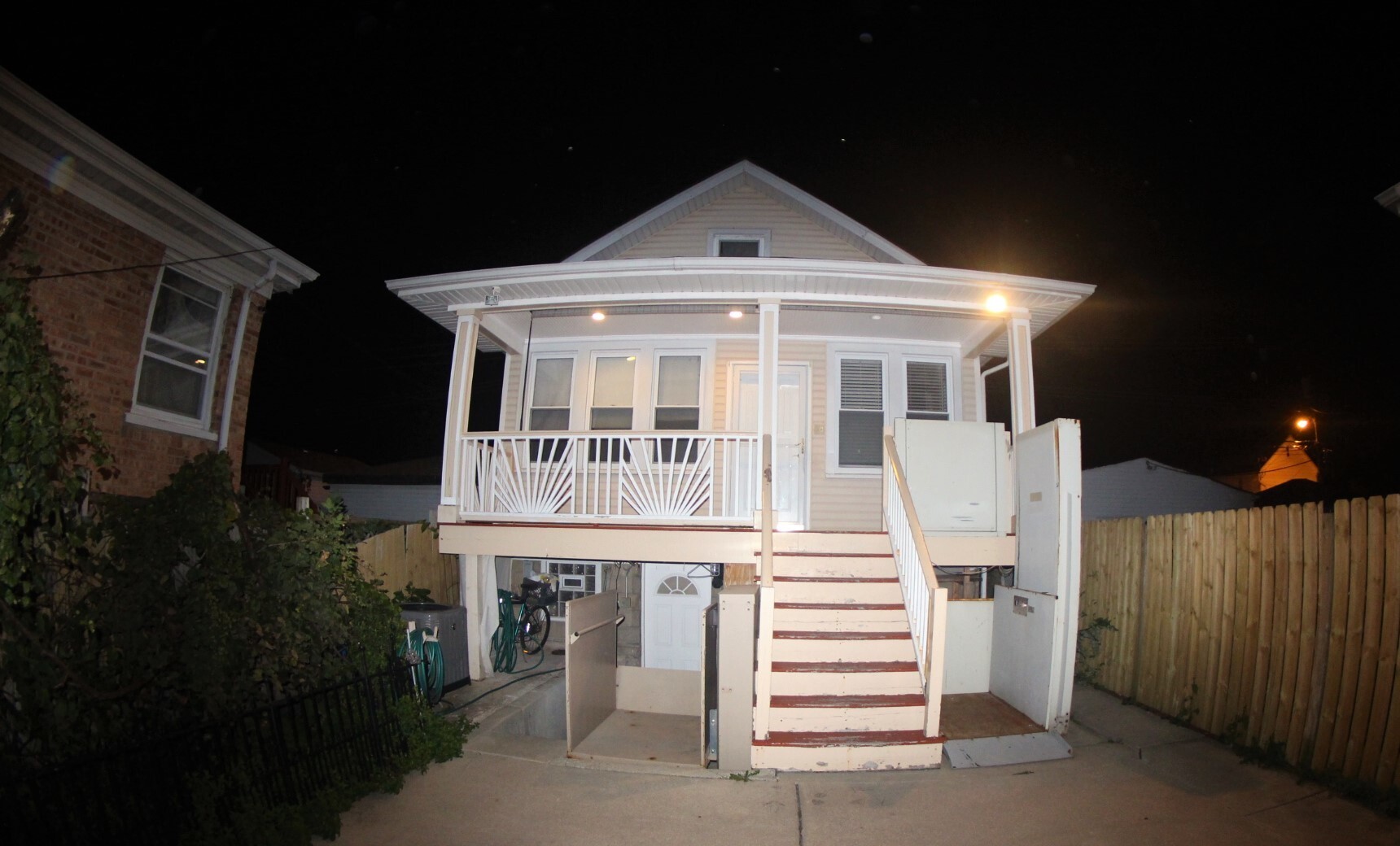 2435 North Rutherford Avenue Chicago, IL 60707 - Photo 1 of 5 a front view of a house with a yard