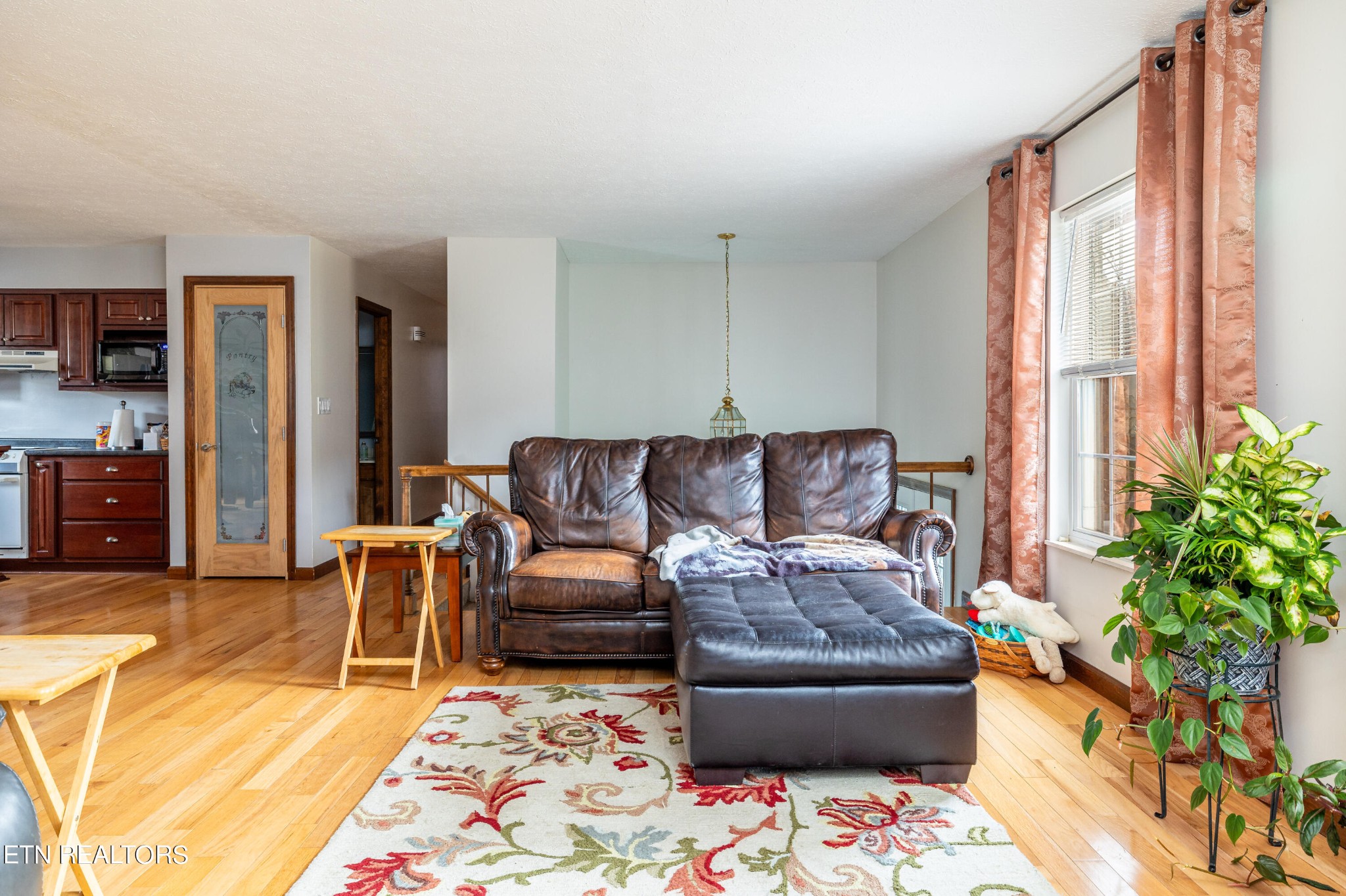625 Riverbend Road Clinton, TN 37716 - Photo 14 of 45 a living room with furniture and a couch