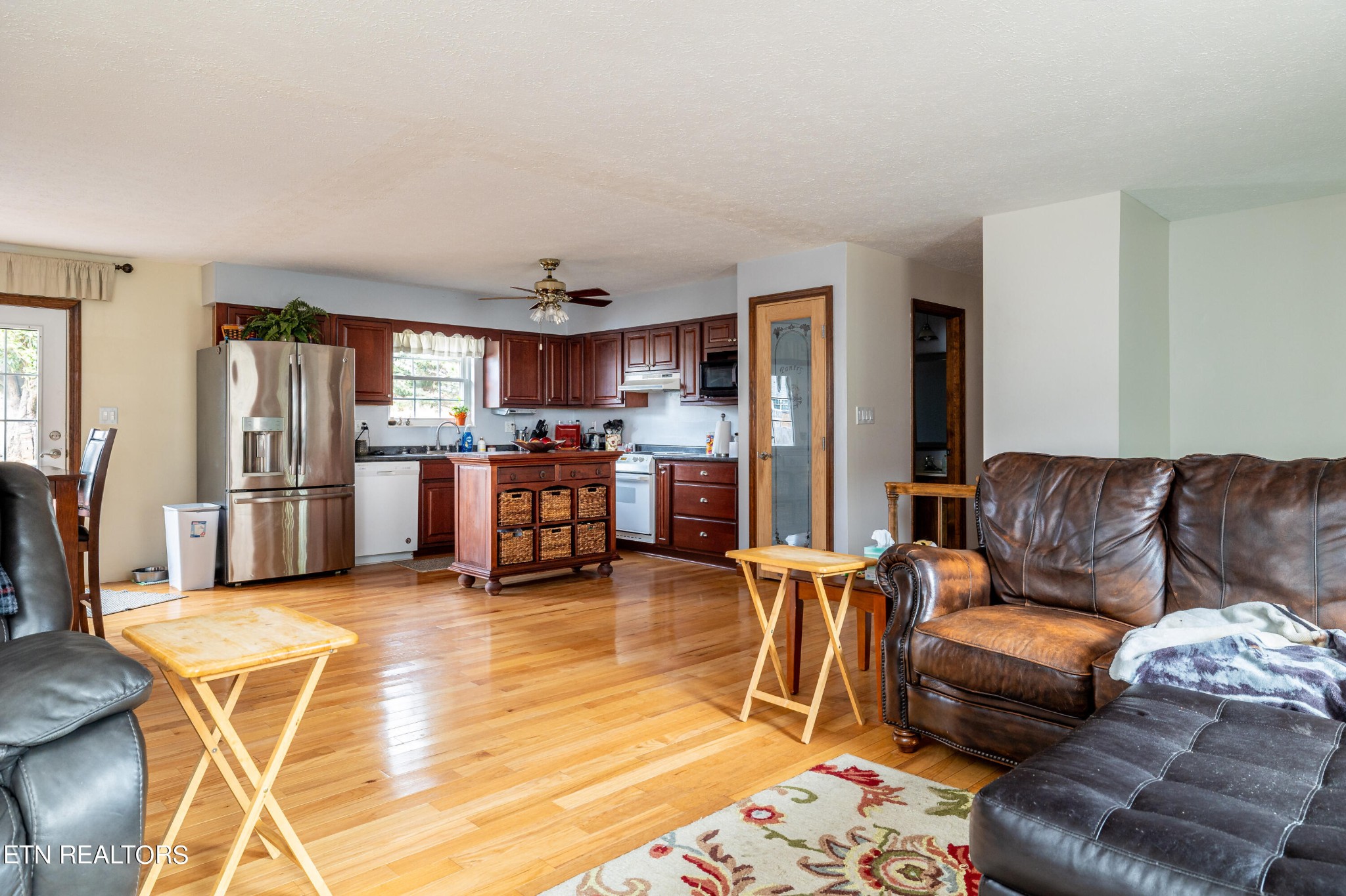 625 Riverbend Road Clinton, TN 37716 - Photo 15 of 45 a living room with furniture and kitchen view