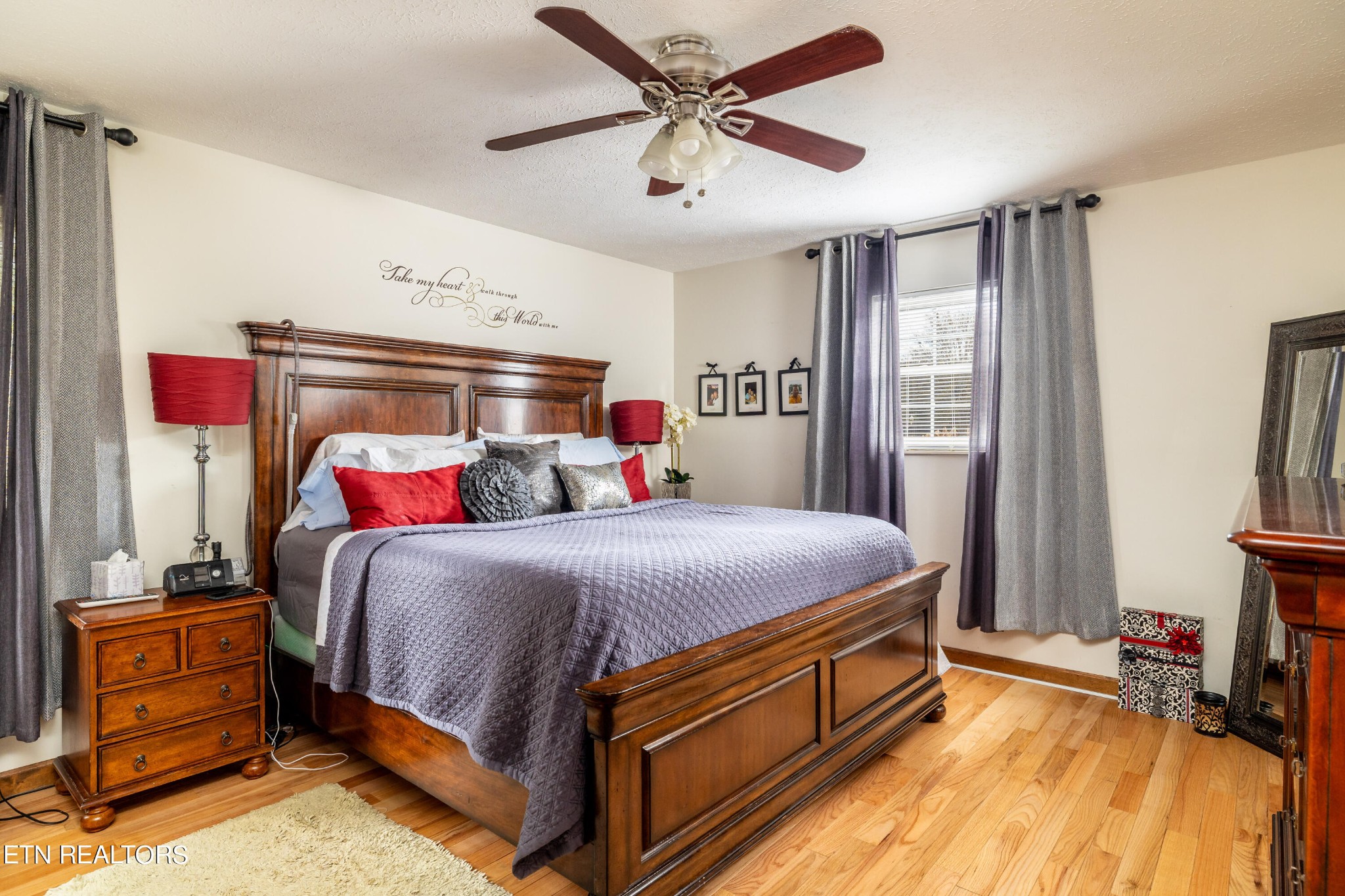 625 Riverbend Road Clinton, TN 37716 - Photo 30 of 45 a bedroom with a bed and a chandelier