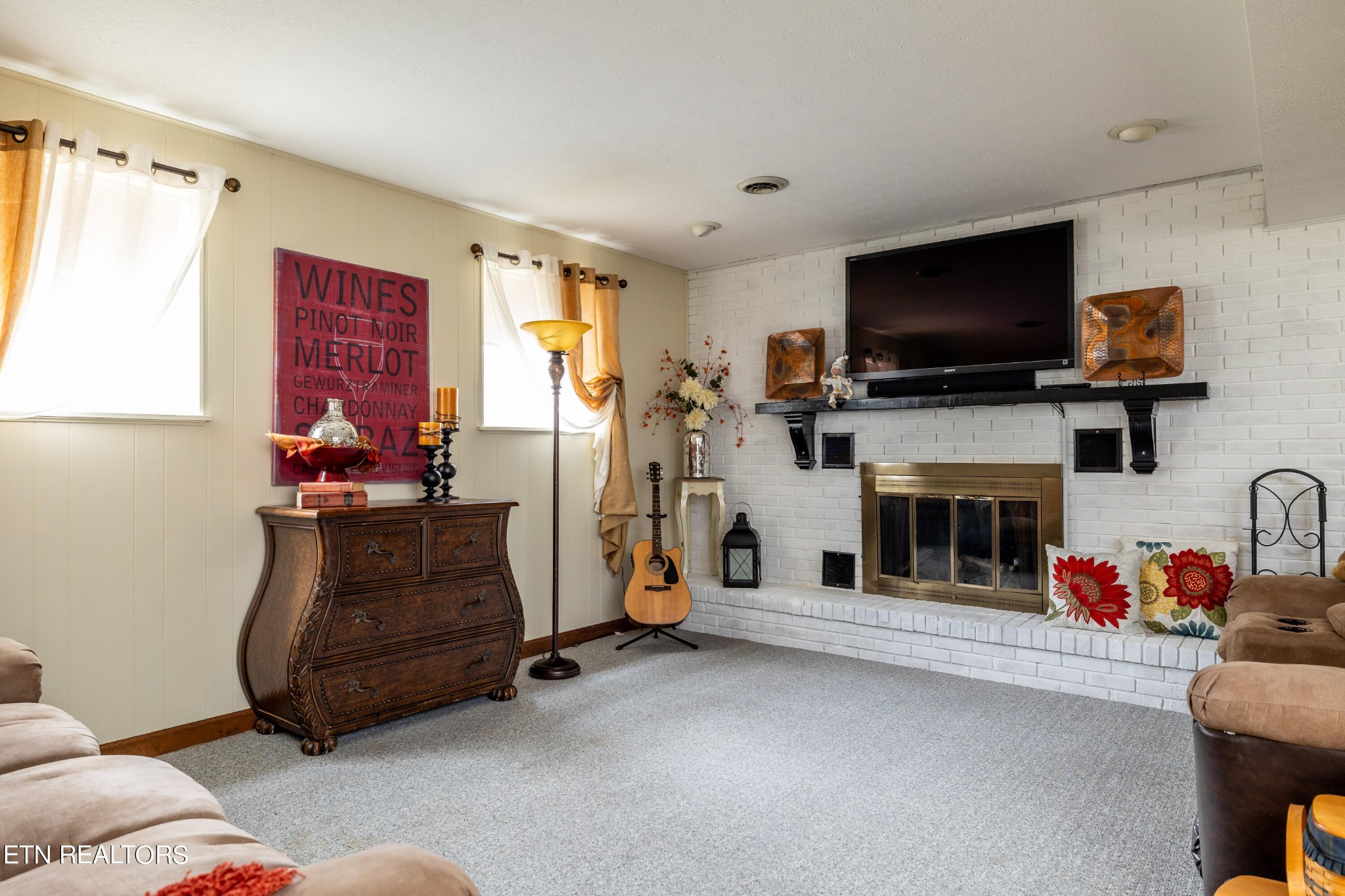 625 Riverbend Road Clinton, TN 37716 - Photo 34 of 45 a living room with furniture and a flat screen tv