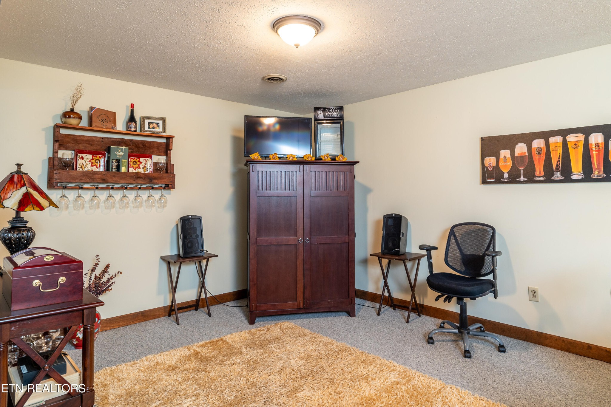 625 Riverbend Road Clinton, TN 37716 - Photo 36 of 45 a view of a workspace with furniture and a window