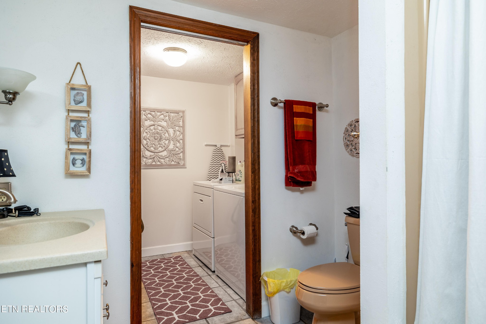 625 Riverbend Road Clinton, TN 37716 - Photo 39 of 45 a bathroom with a sink and a toilet