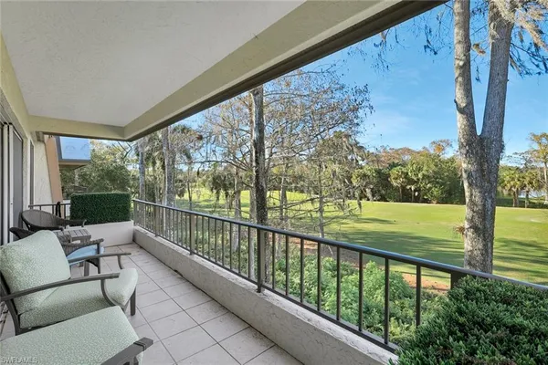 a view of a two chair in the balcony