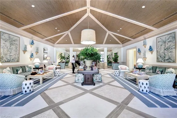 a living room with furniture and white walls
