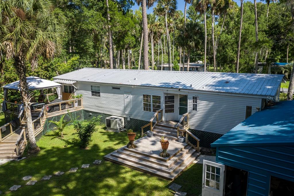 24516 Fox Road Astor, FL 32102 - Photo 1 of 1 Canal front home with numerous upgrades in 2019 including 20X30 workshop.