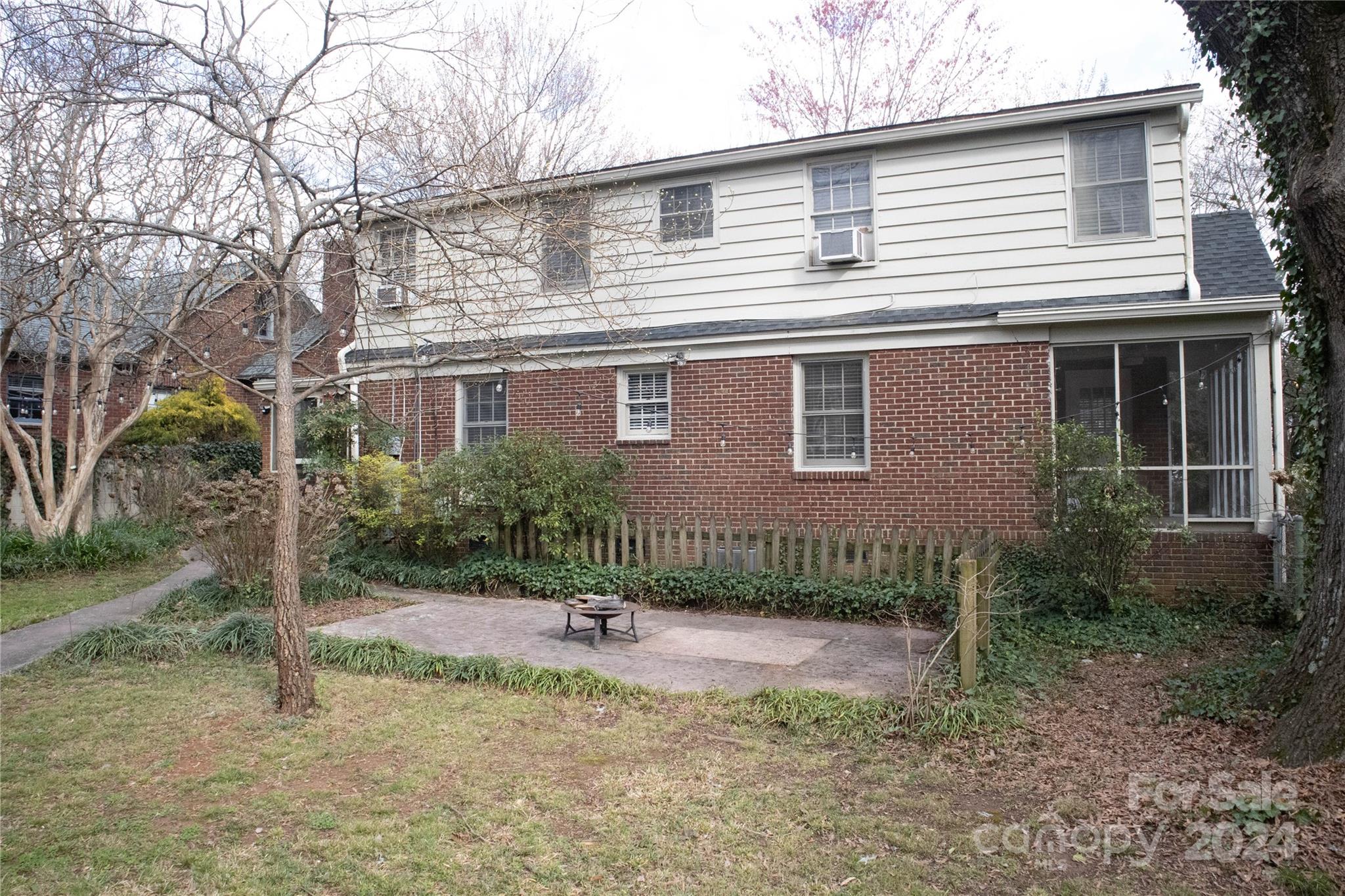 2932 Park Road Charlotte, NC 28209 - Photo 14 of 17 a front view of a house with a yard