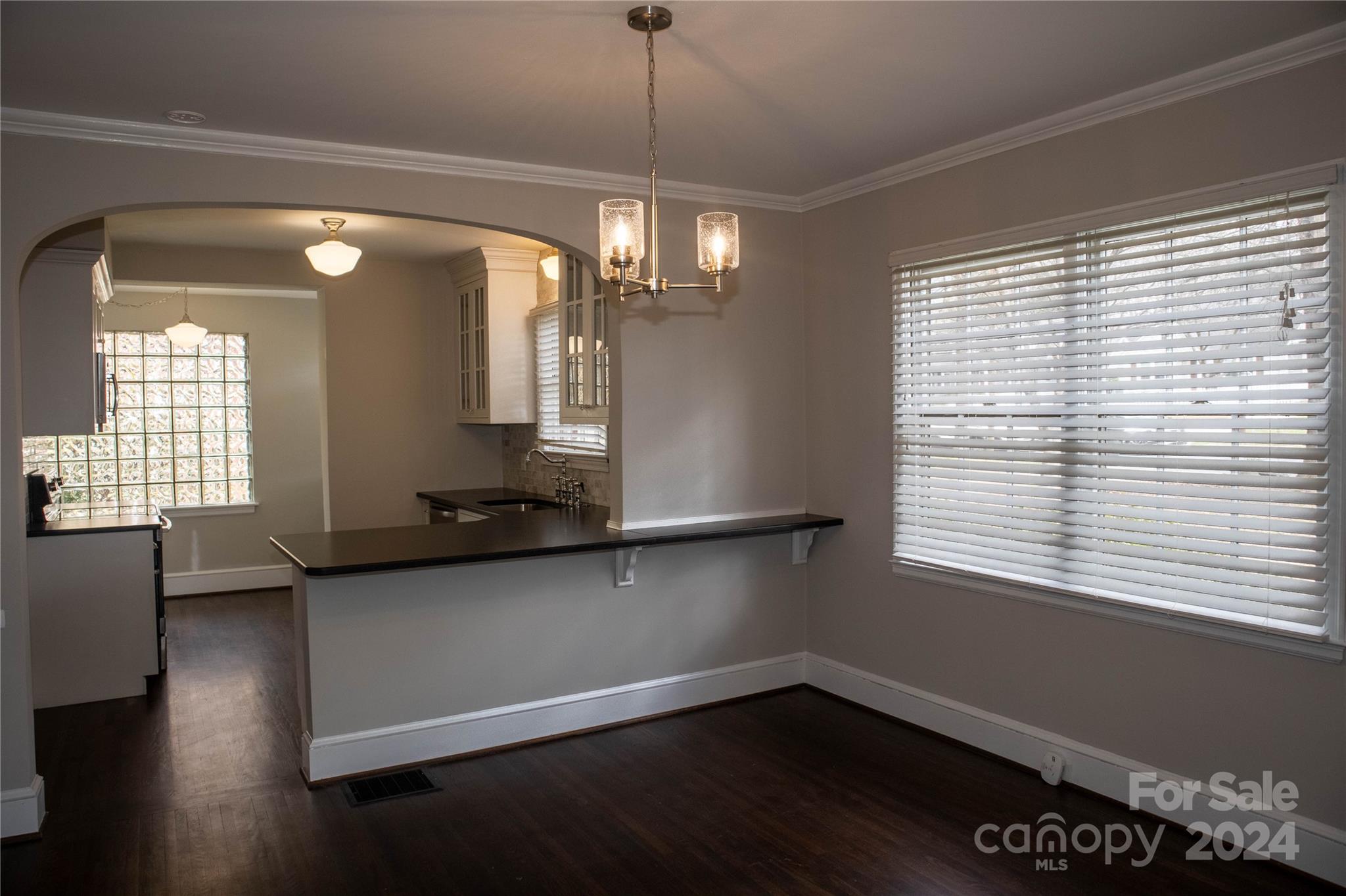 2932 Park Road Charlotte, NC 28209 - Photo 5 of 17 a hallway with a large window