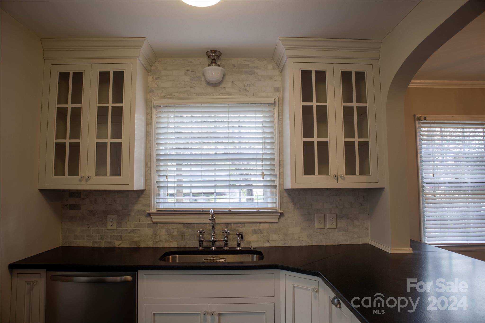 2932 Park Road Charlotte, NC 28209 - Photo 8 of 17 a kitchen with a sink and cabinets