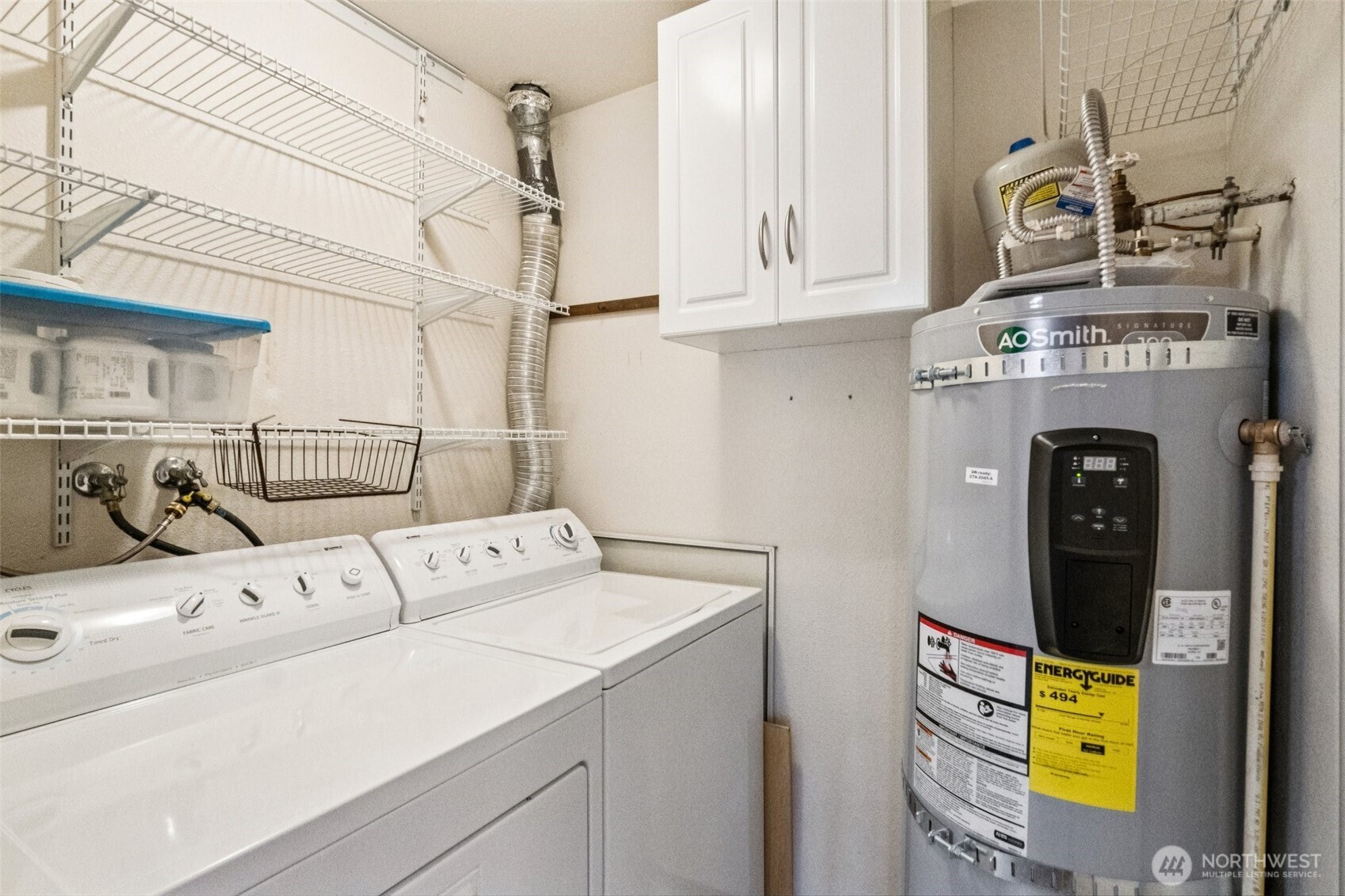 5502 220th Street Southwest, Unit D201 Mountlake Terrace, WA 98043 - Photo 15 of 19 a utility room with dryer and washer