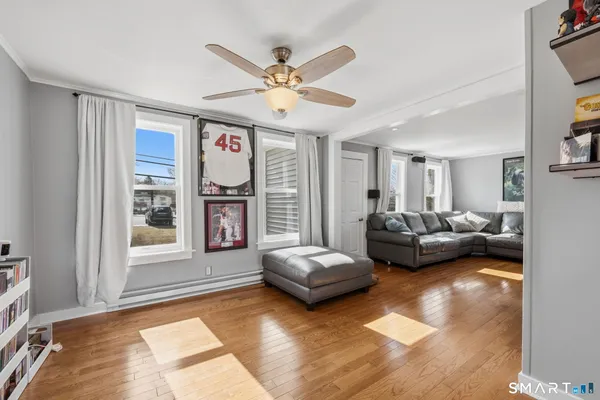 a living room with furniture and a window