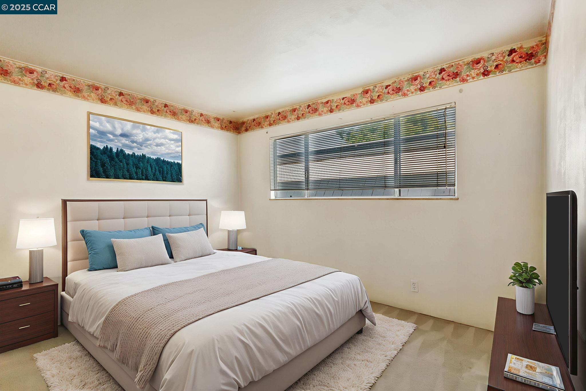 9085 Alcosta Boulevard, Unit 340 San Ramon, CA 94583 - Photo 12 of 25 a bedroom with a bed and wooden floor